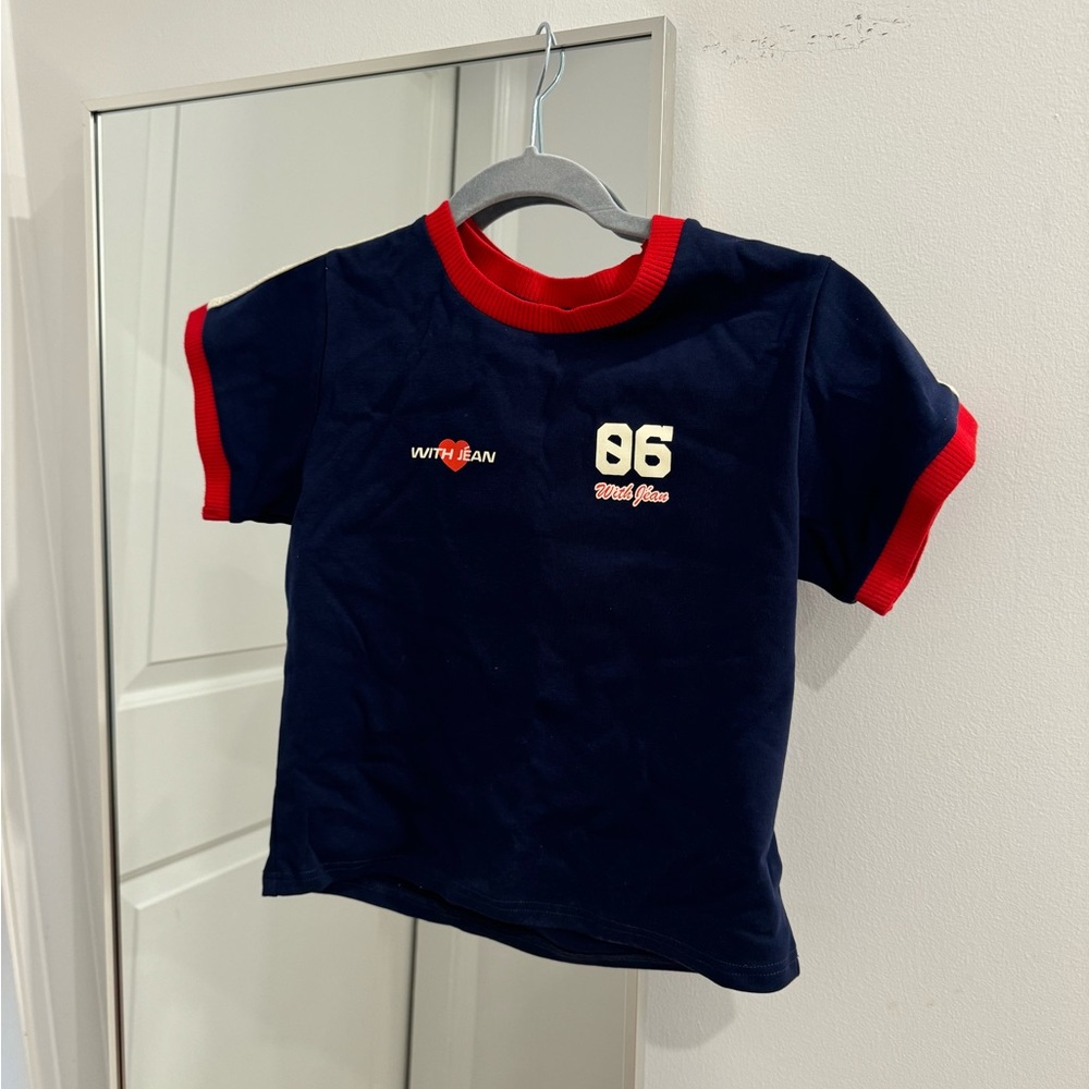 With Jean Champions Tee